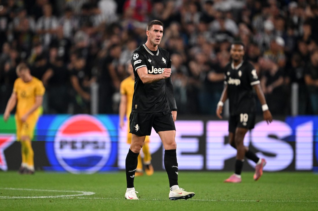TURIN, ITALY - SEPTEMBER 16: Dusan Vlahovic of Juventus celebrates scoring his team's third goal during the UEFA Champions League 2025/26 League Phase MD1 match between Juventus and Borussia Dortmund at Juventus Stadium on September 16, 2025 in Turin, Italy. (Photo by Tullio Puglia - UEFA/UEFA via Getty Images)