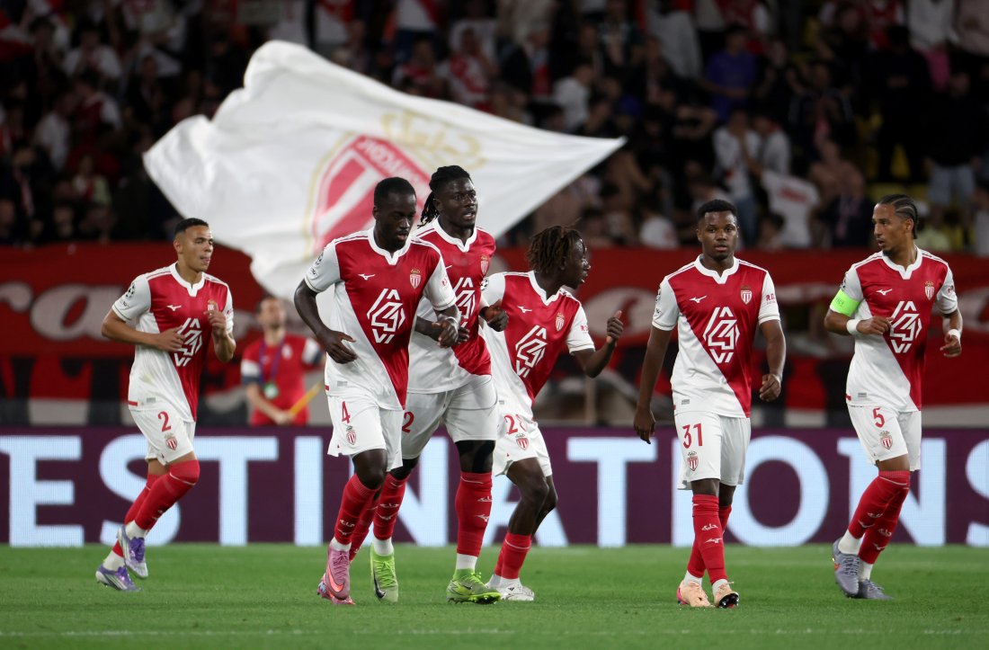 MONACO, MONACO - OCTOBER 01: Jordan Teze of Monaco celebrates scoring his team's first goal with teammates during the UEFA Champions League 2025/26 League Phase MD2 match between AS Monaco and Manchester City at Stade Louis II on October 01, 2025 in Monaco, Monaco. (Photo by Francesco Scaccianoce - UEFA/UEFA via Getty Images)