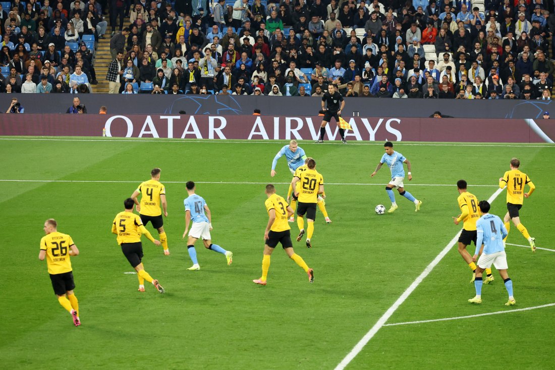 MANCHESTER, ENGLAND - NOVEMBER 05: Qatar Airways LED boards during the UEFA Champions League 2025/26 League Phase MD4 match between Manchester City and Borussia Dortmund at City of Manchester Stadium on November 05, 2025 in Manchester, England. (Photo by Matt McNulty/Getty Images)