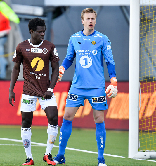 LEVENDE VEGG: Bodø/Glimt slo Mjøndalen 1-0 på Aspmyra tidligere i år. Ricardo holdt nullen mot Ousseynou Boye og resten av Mjøndalen-spillerne. FOTO: Kent Even Grundstad